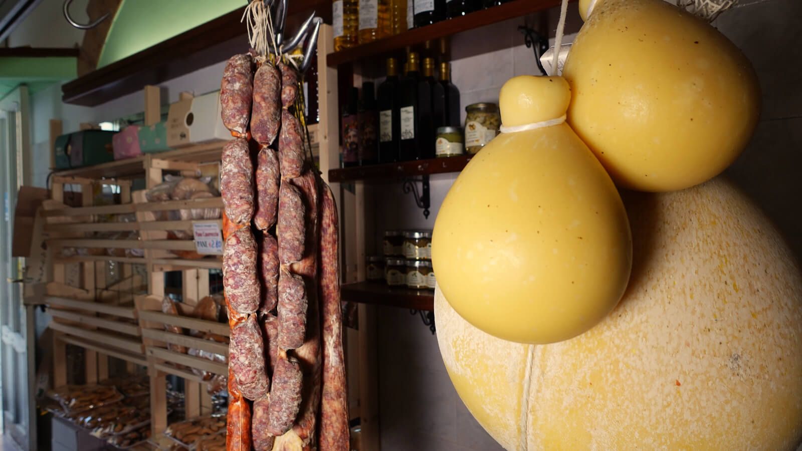 Cheese and sausages hanging from the ceiling